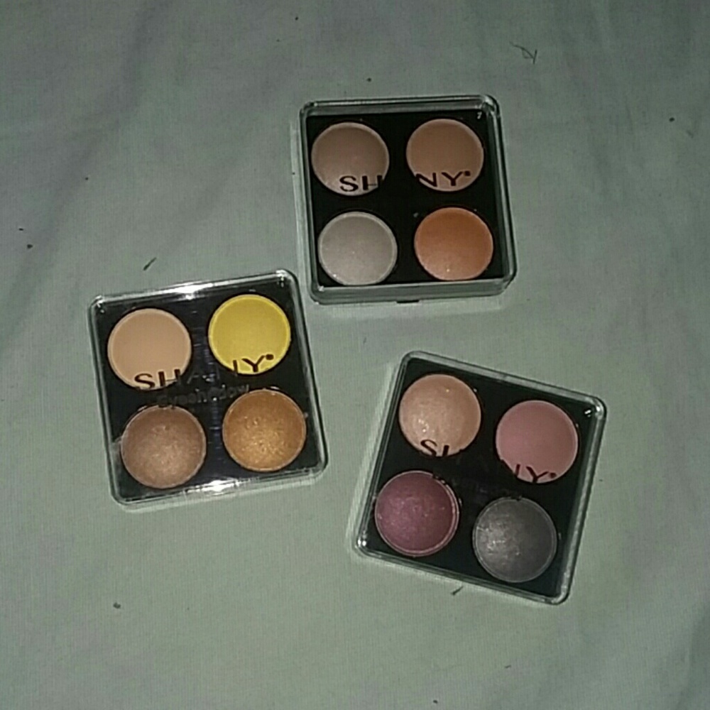 Three eyeshadow palettes